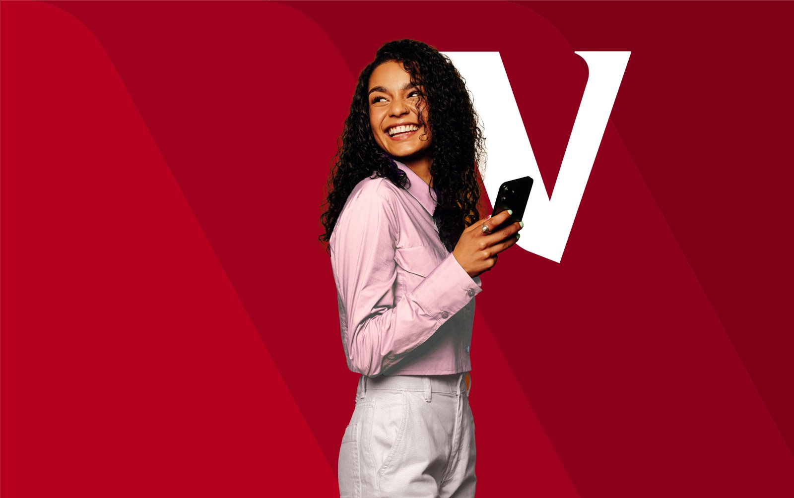 Smiling investor with Vanguard V